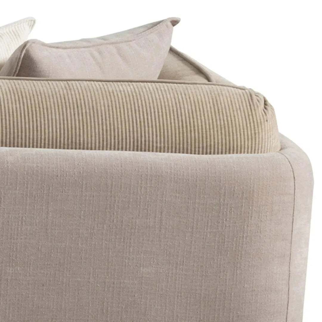 Modern corduroy velvet fabric 4 seater sofa fluff in close up details.