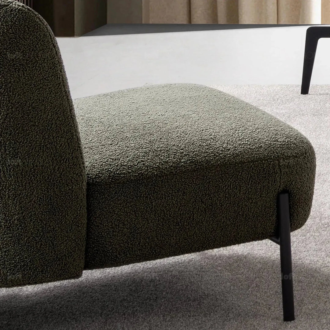 Modern sherpa fabric 1 seater sofa atrium in close up details.