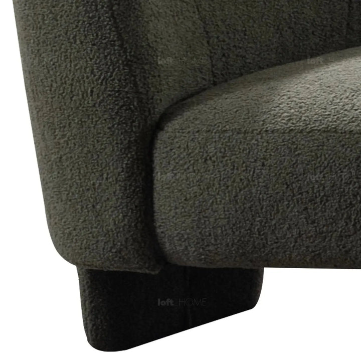 Modern sherpa fabric 1 seater sofa atrium with context.