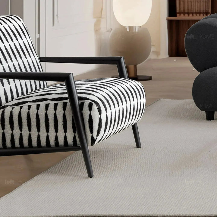Modern mixed weave fabric 1 seater sofa feldspar with context.