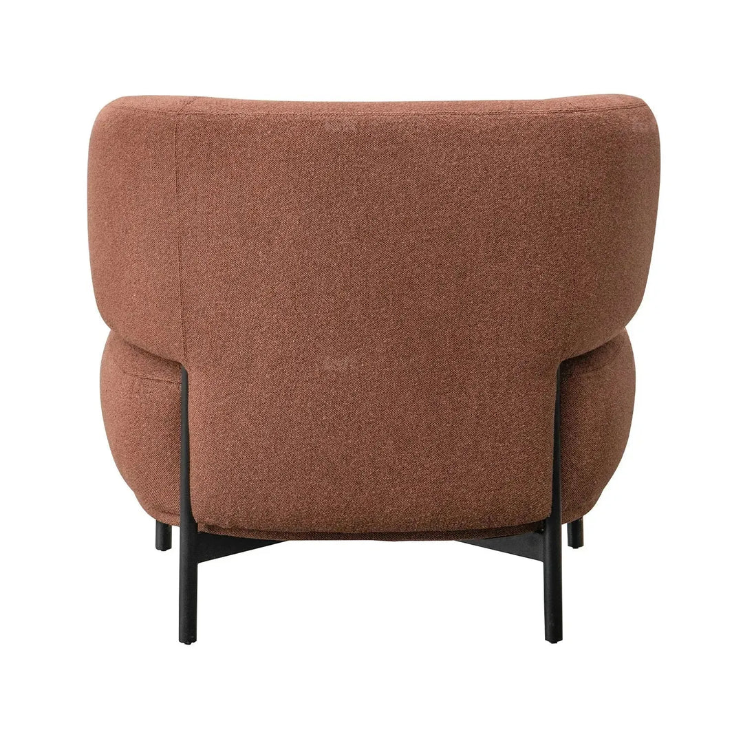 Cream mixed weave fabric 1 seater sofa hinger with context.