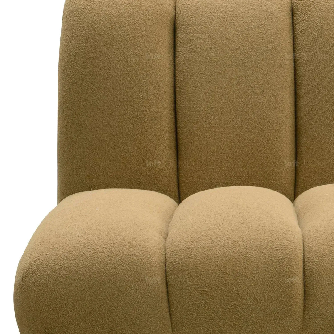 Cream sherpa fabric revolving 1 seater sofa limestone in close up details.