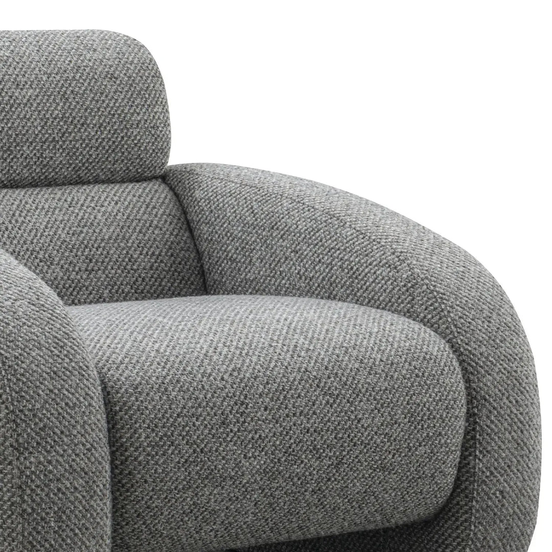 Modern mixed weave fabric 1 seater sofa monolithe with context.