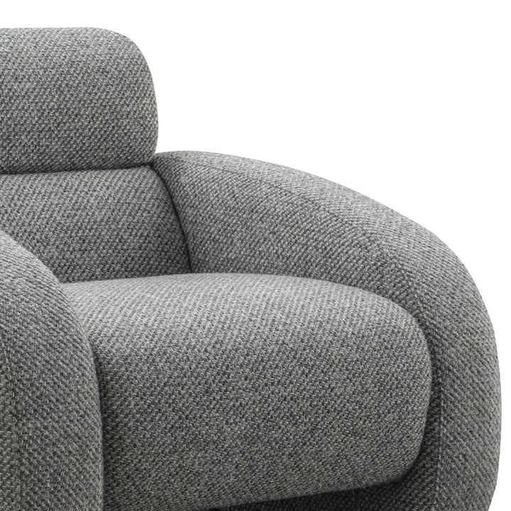 Modern mixed weave fabric 1 seater sofa monolithe with context.