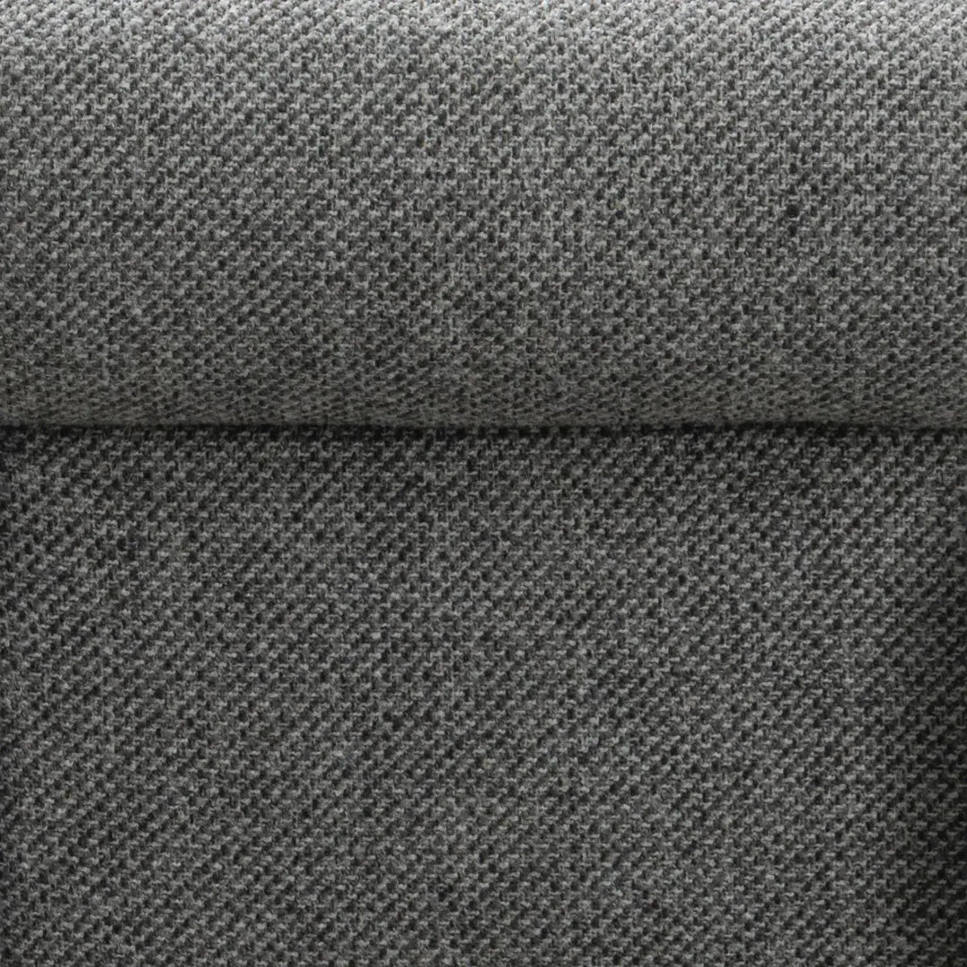 Modern mixed weave fabric 1 seater sofa monolithe in close up details.