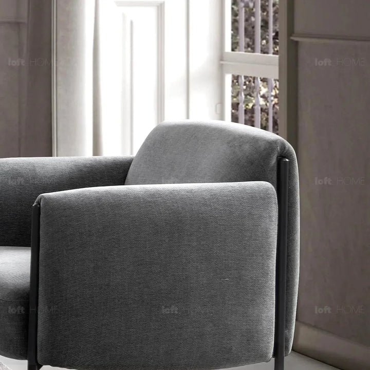 Modern mixed weave fabric 1 seater sofa mosaic in close up details.