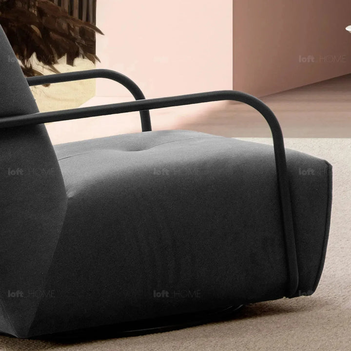 Modern mixed weave fabric revolving 1 seater sofa talc metal in panoramic view.