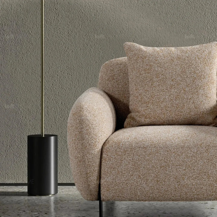 Modern mixed weave fabric 1 seater sofa talc in close up details.