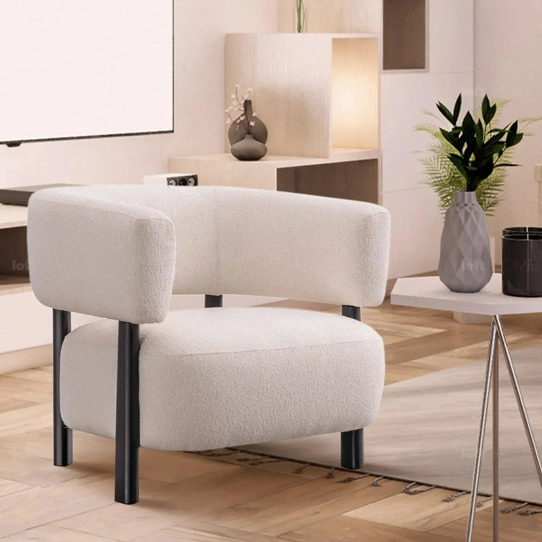 Modern boucle fabric 1 seater sofa topaz in close up details.