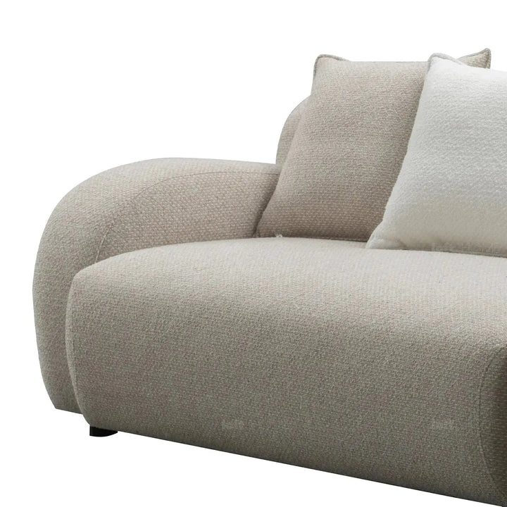 Modern mixed weave fabric 4 seater sofa ench with context.