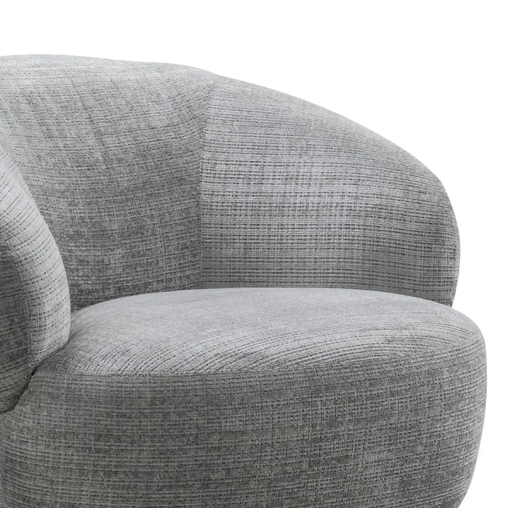 Cream mixed weave fabric revolving 1 seater sofa criet in real life style.