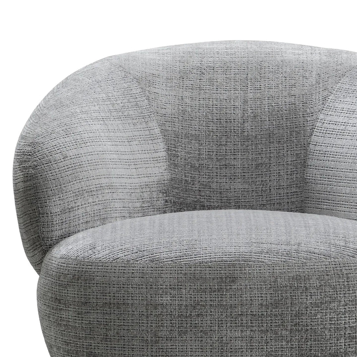 Cream mixed weave fabric revolving 1 seater sofa criet with context.
