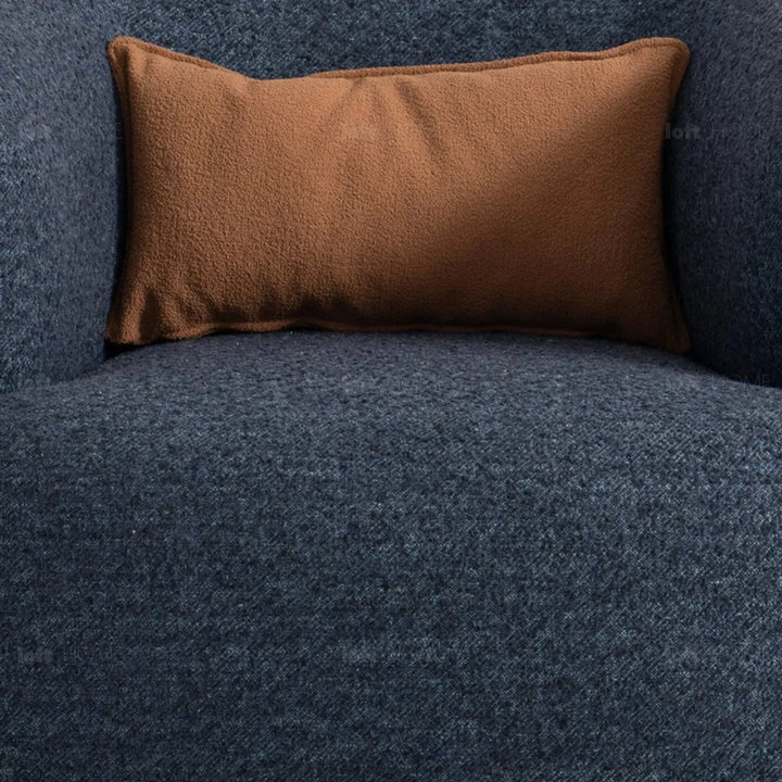Cream boucle fabric revolving 1 seater sofa vance in close up details.