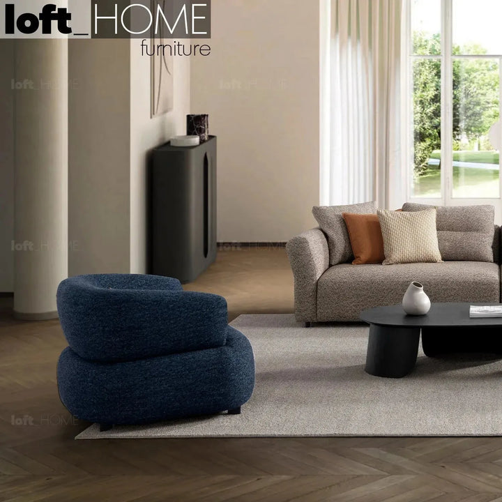 Cream boucle fabric revolving 1 seater sofa vance with context.