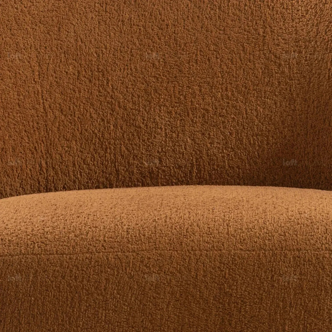 Cream sherpa fabric revolving 1 seater sofa vigor in panoramic view.