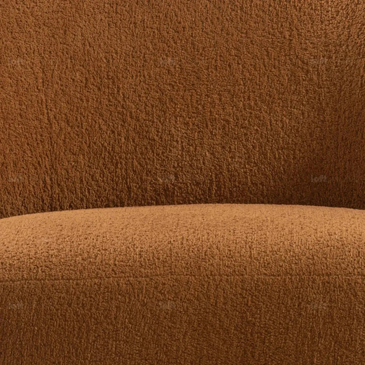 Cream sherpa fabric revolving 1 seater sofa vigor in panoramic view.