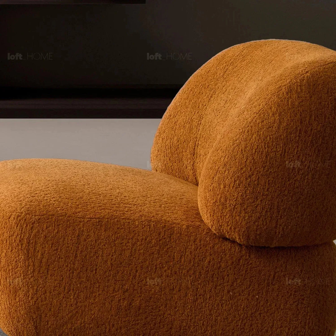 Cream sherpa fabric revolving 1 seater sofa vigor in close up details.