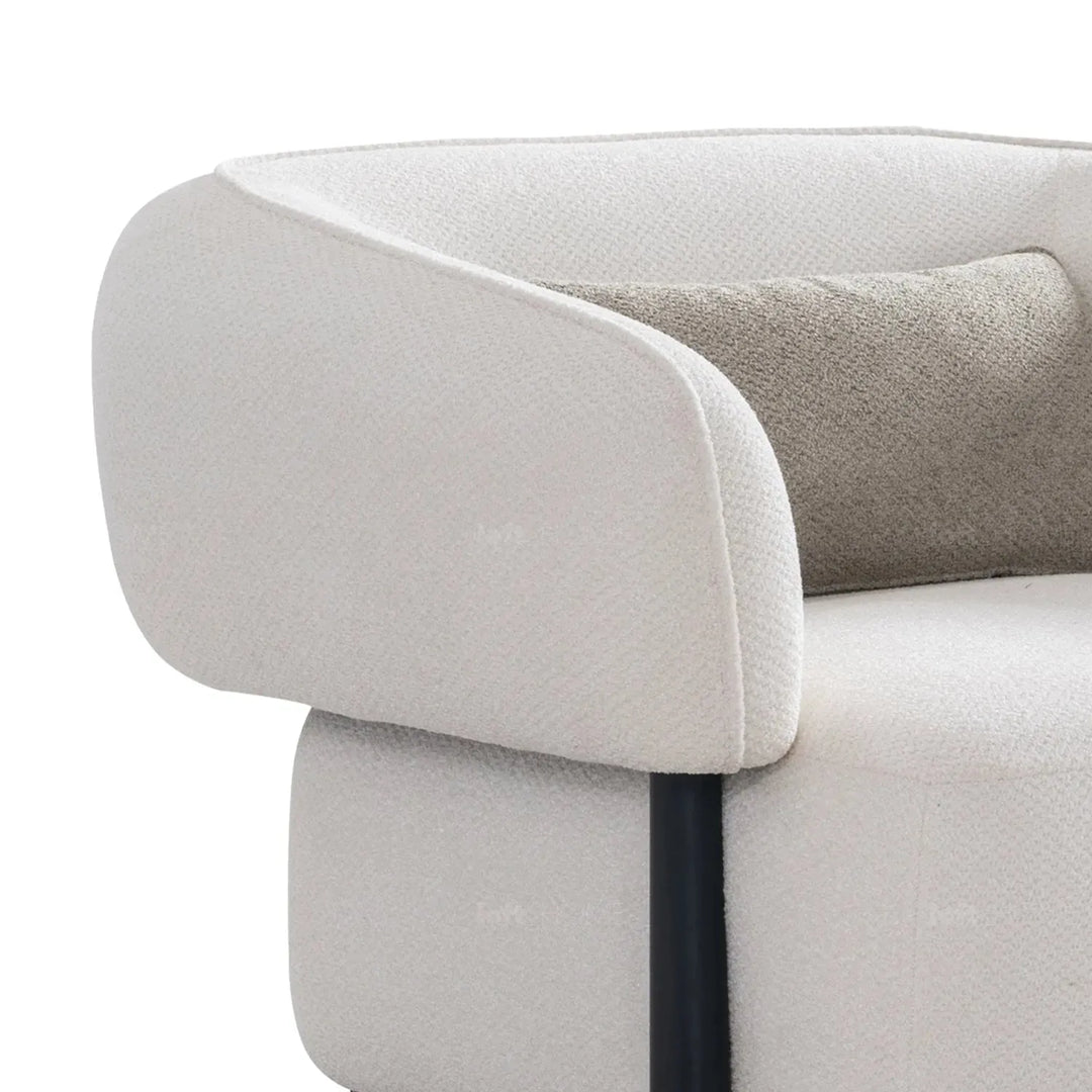 Cream mixed weave fabric 1 seater sofa callee in real life style.