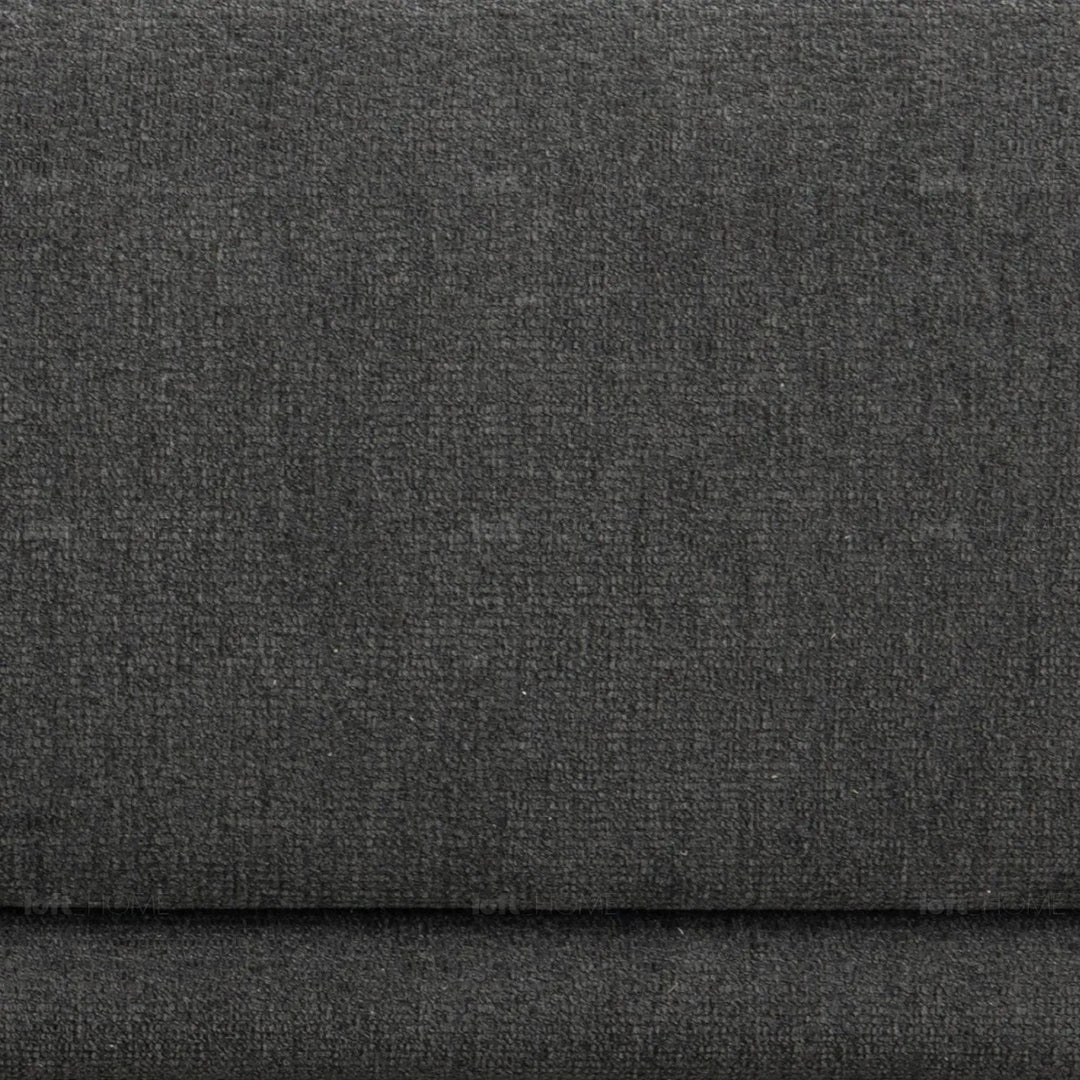 Modern mixed weave fabric 2 seater sofa oble in panoramic view.