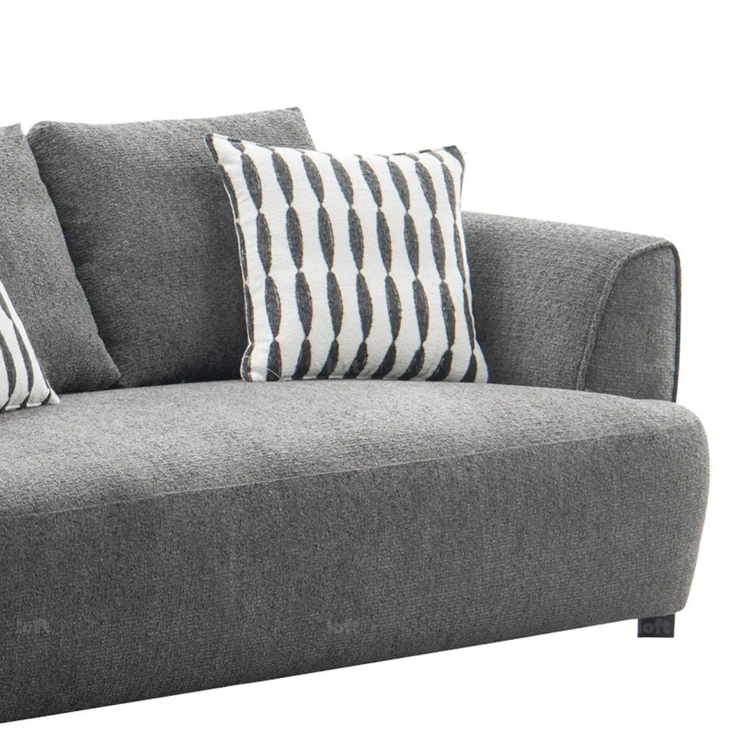 Modern mixed weave fabric 2 seater sofa oble with context.