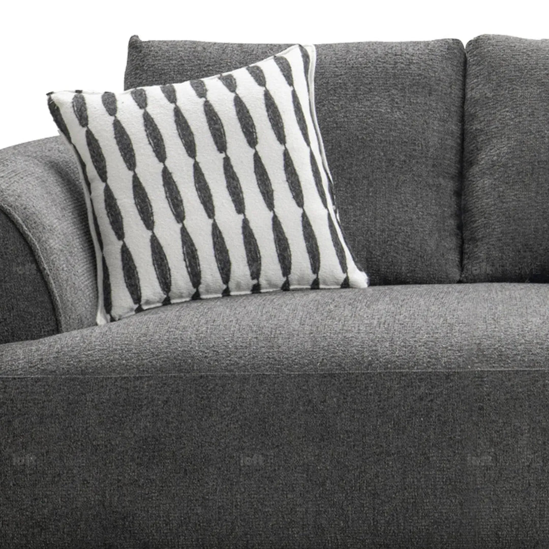 Modern mixed weave fabric 2 seater sofa oble in close up details.