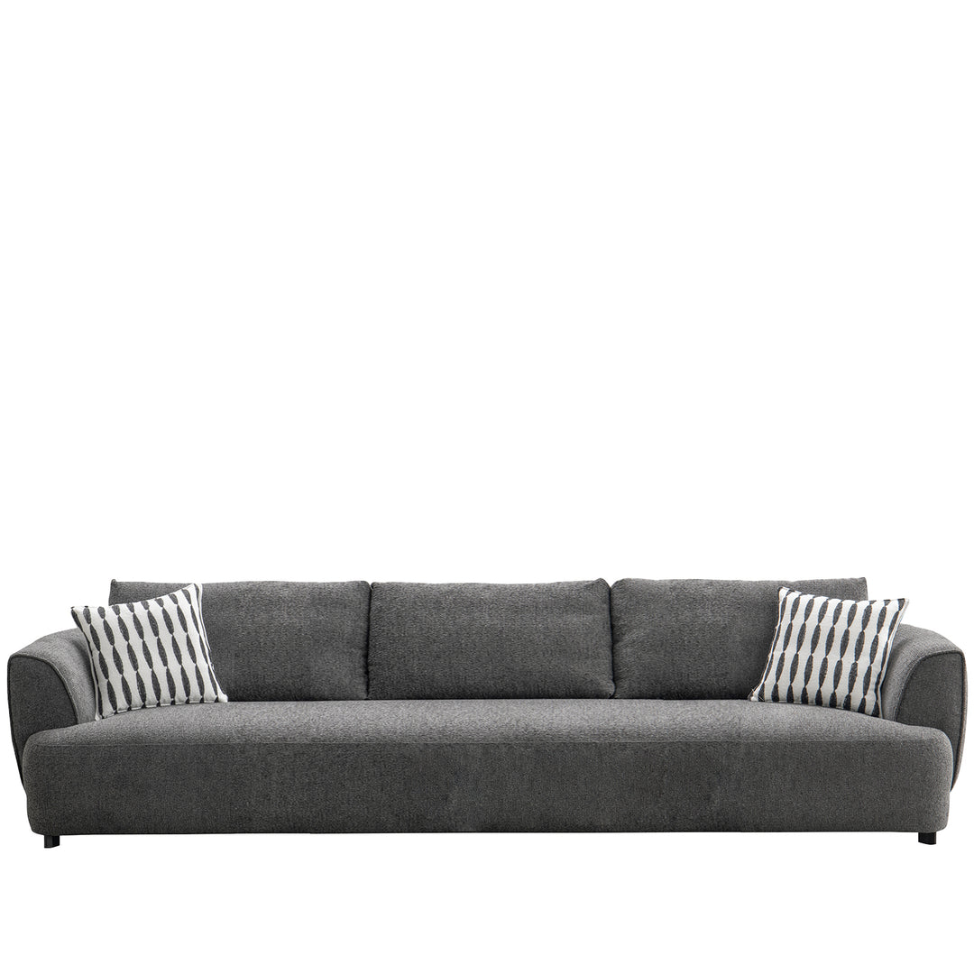 Modern mixed weave fabric 3 seater sofa oble in still life.