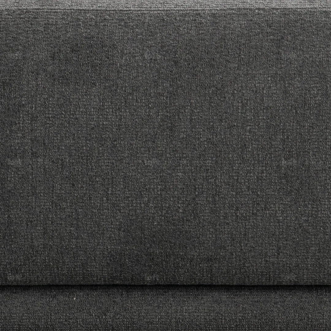 Modern mixed weave fabric 3 seater sofa oble in panoramic view.