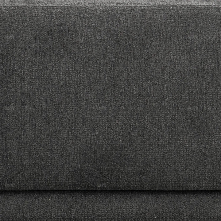 Modern mixed weave fabric 3 seater sofa oble in panoramic view.