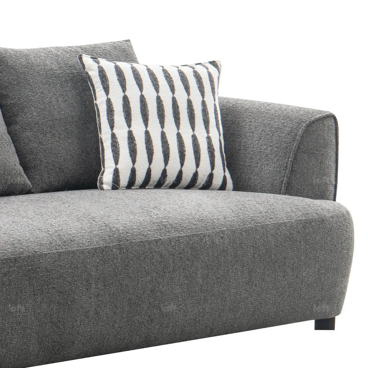 Modern mixed weave fabric 3 seater sofa oble with context.