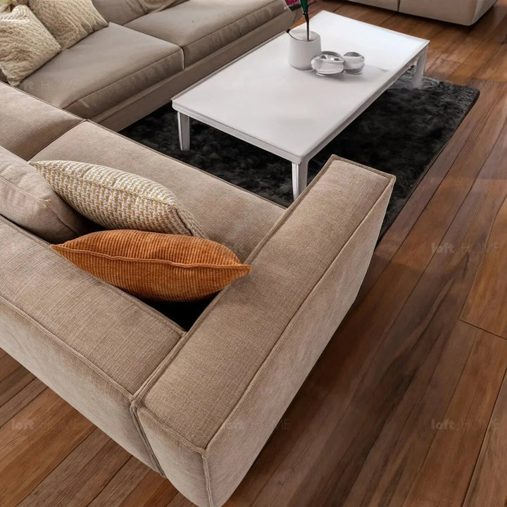 Minimalist mixed weave fabric 4 seater sofa cyus in still life.