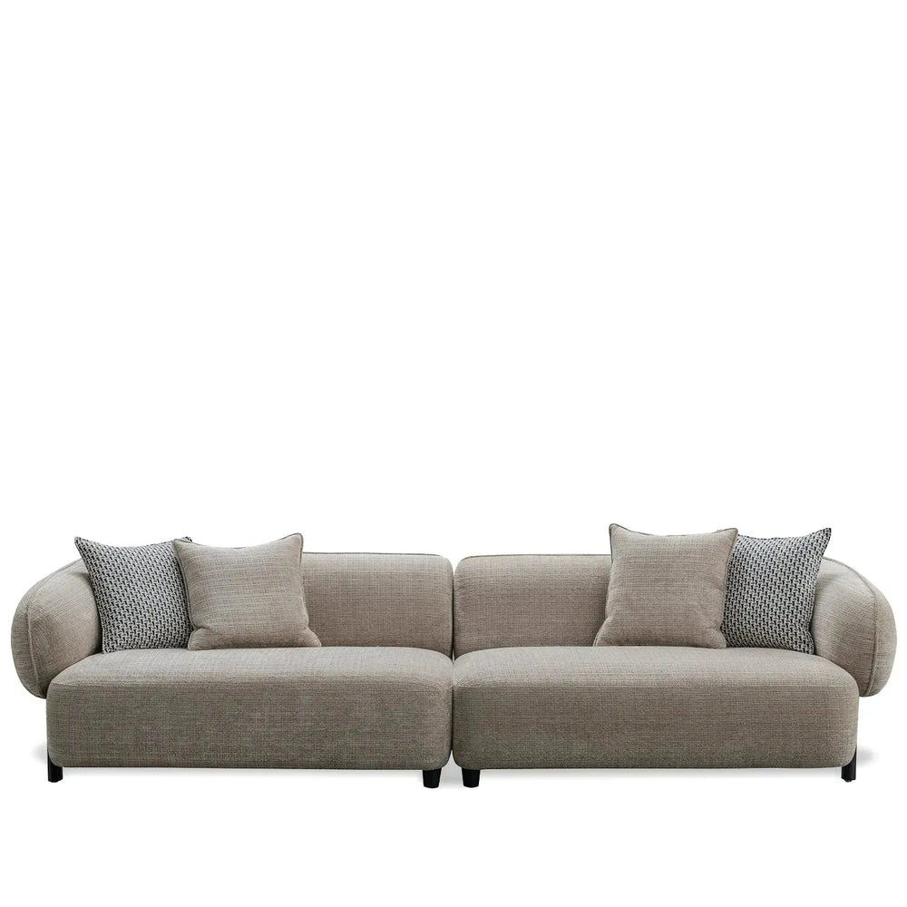 Modern mixed weave fabric 4 seater sofa ense in white background.