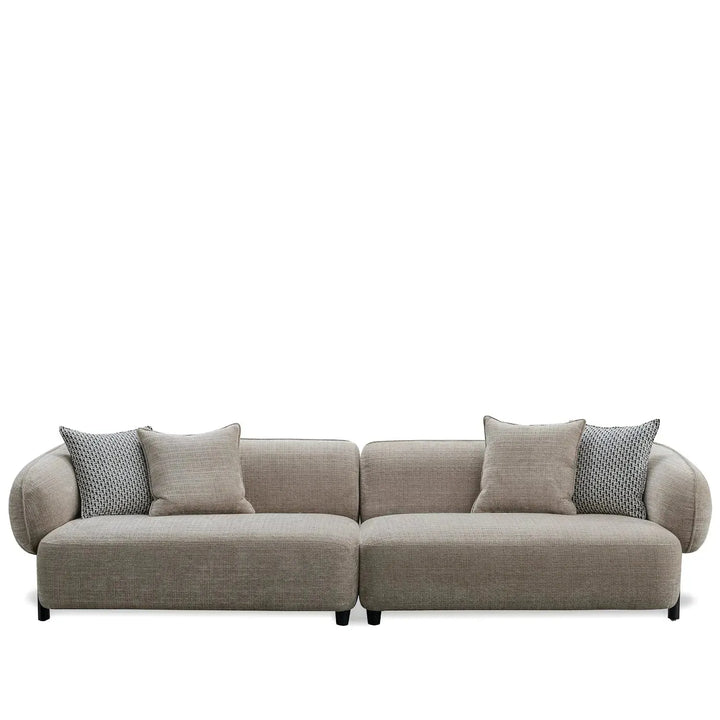 Modern mixed weave fabric 4 seater sofa ense in white background.