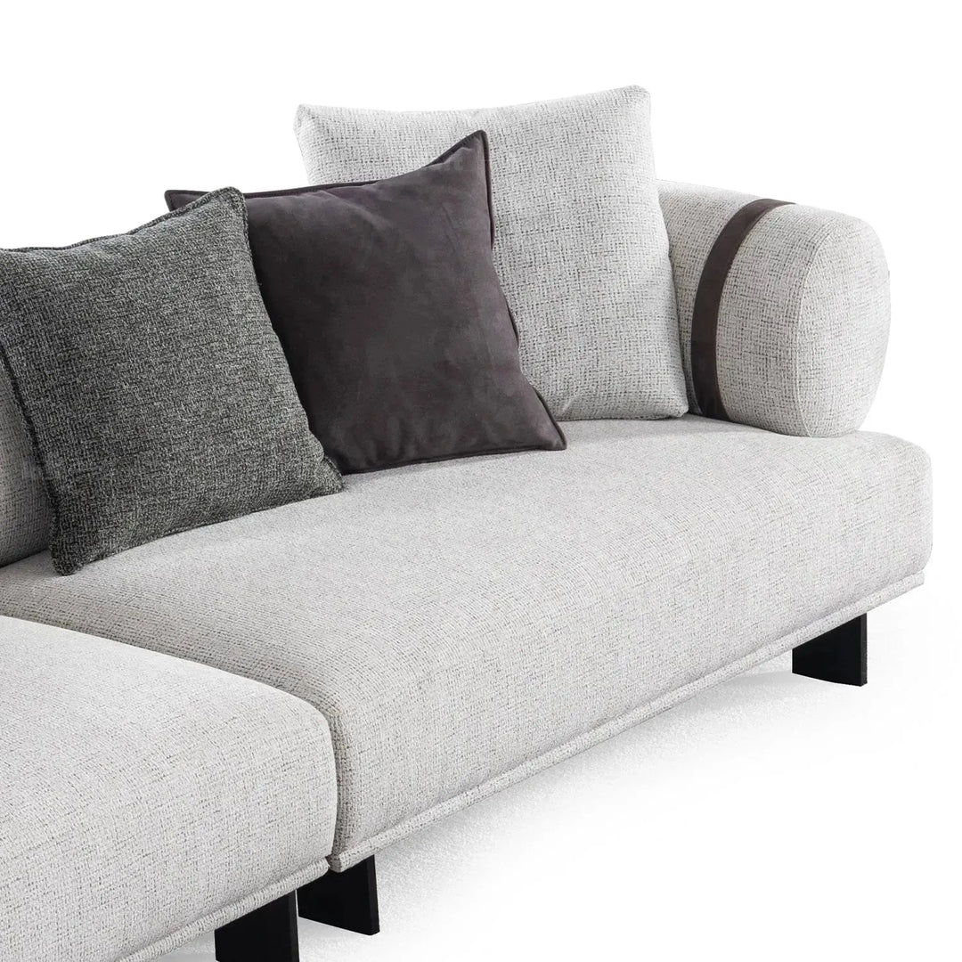 Modern mixed weave fabric 4 seater sofa divan in panoramic view.