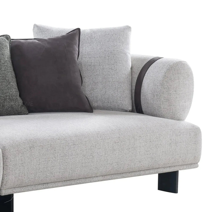 Modern mixed weave fabric 4 seater sofa divan in details.