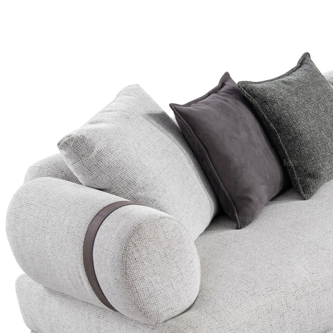 Modern mixed weave fabric 4 seater sofa divan in close up details.