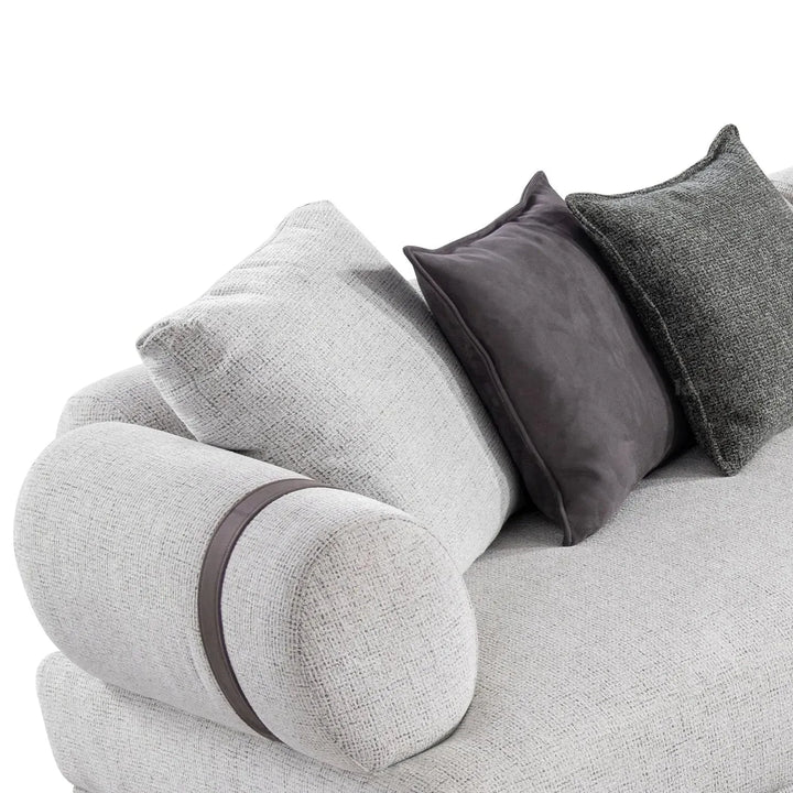 Modern mixed weave fabric 4 seater sofa divan in close up details.