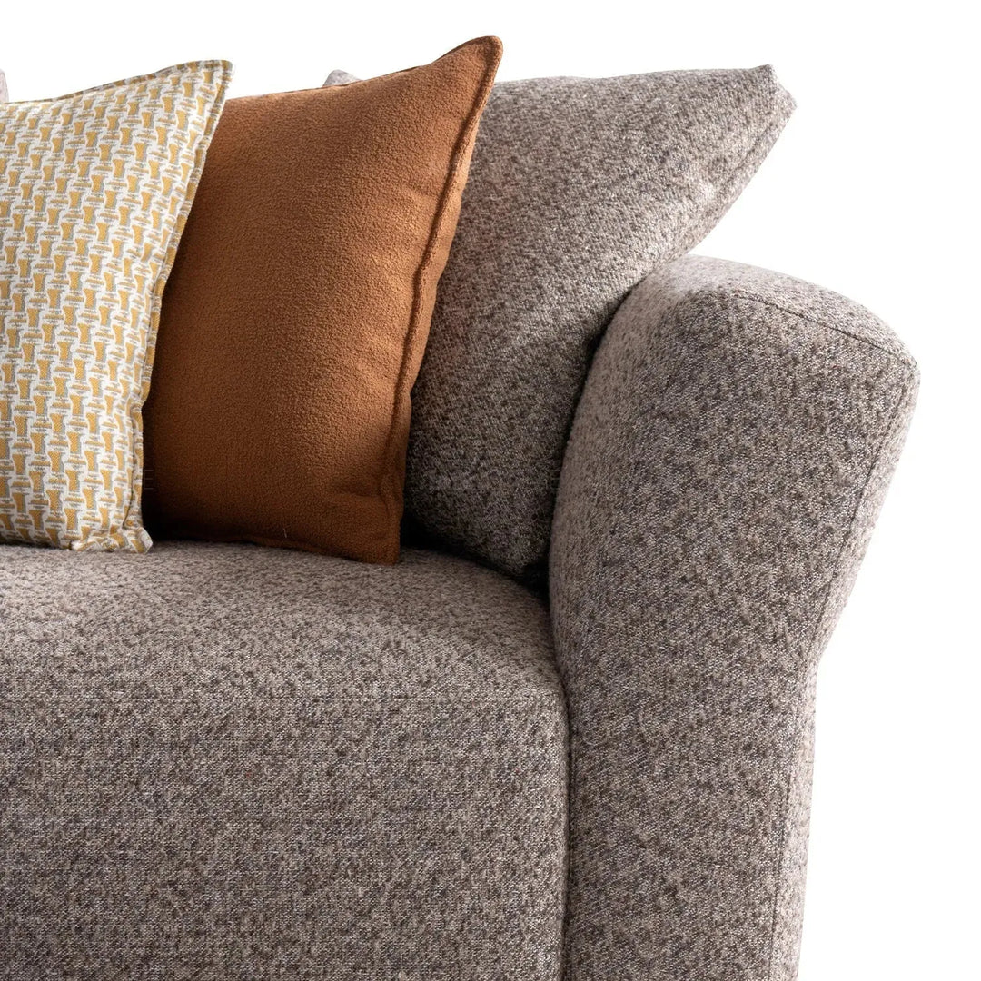 Minimalist mixed weave fabric 4 seater sofa glider in real life style.
