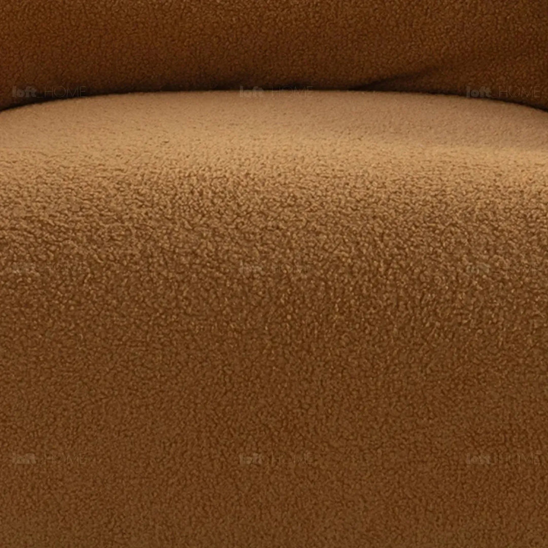 Modern sherpa fabric 1 seater sofa saffron in panoramic view.