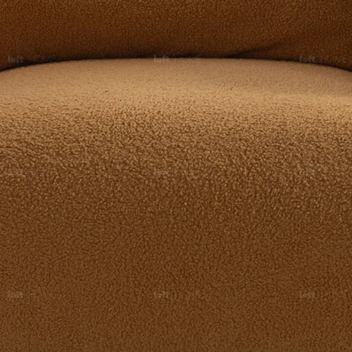 Modern sherpa fabric 1 seater sofa saffron in panoramic view.