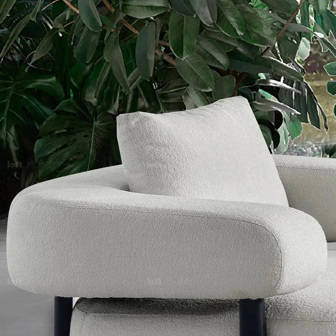 Modern sherpa fabric 1 seater sofa simplicity in close up details.