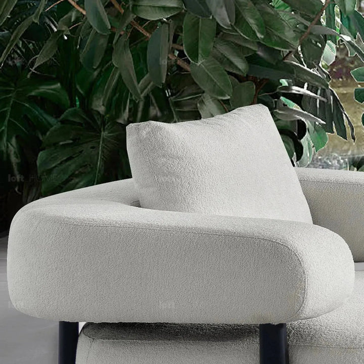 Modern sherpa fabric 1 seater sofa simplicity in close up details.