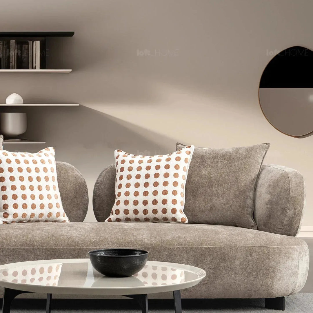 Cream sherpa fabric 3 seater sofa calyx in panoramic view.