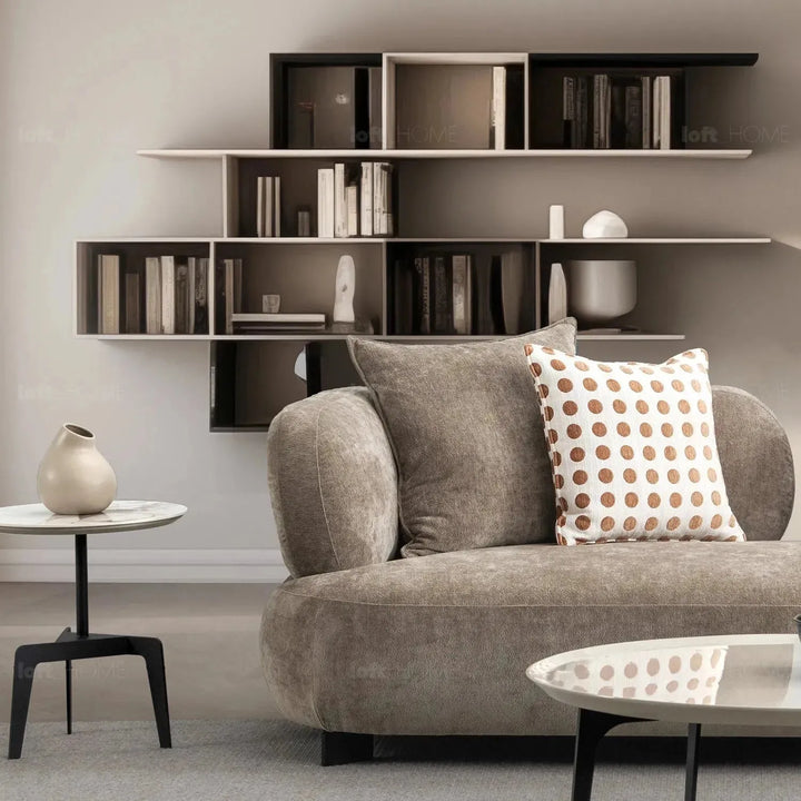 Cream sherpa fabric 3 seater sofa calyx in close up details.