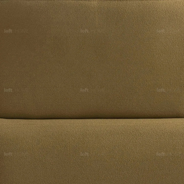 Cream sherpa fabric 5 seater sofa arch in panoramic view.