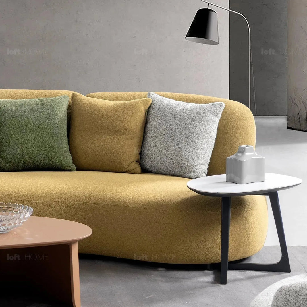 Cream sherpa fabric 5 seater sofa arch in close up details.