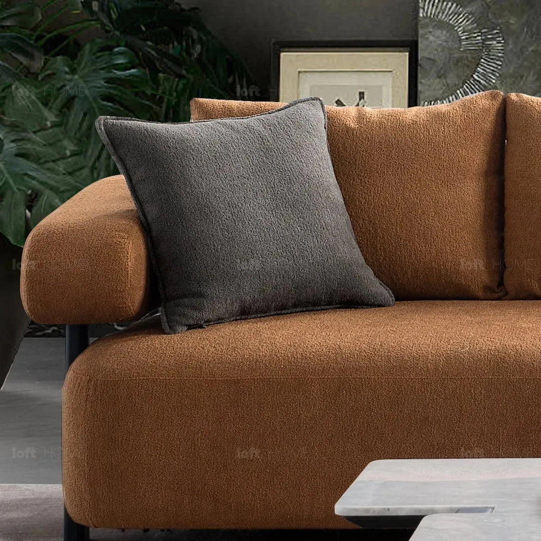 Modern sherpa fabric 4 seater sofa echo in close up details.