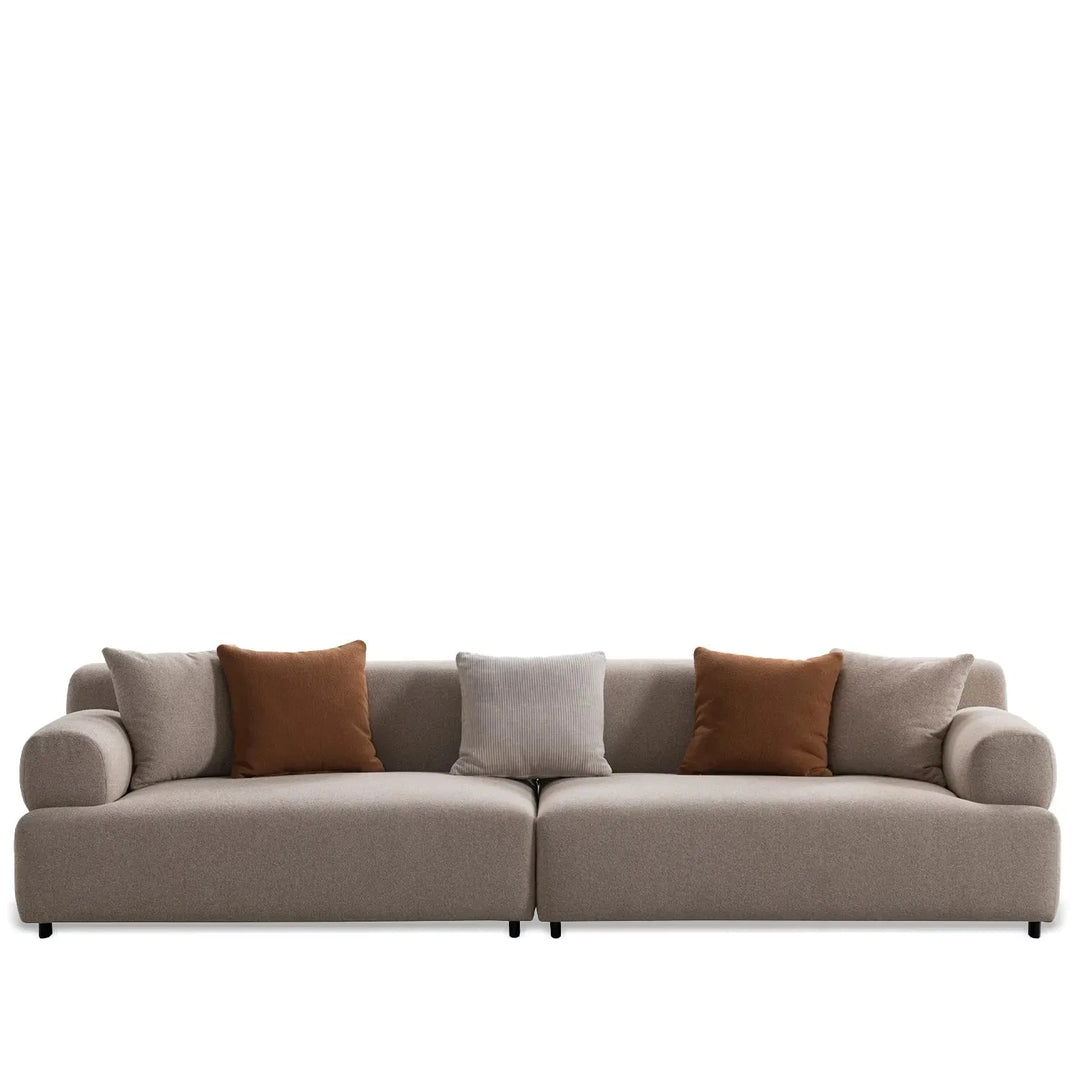 Minimalist sherpa fabric 4 seater sofa noble in white background.