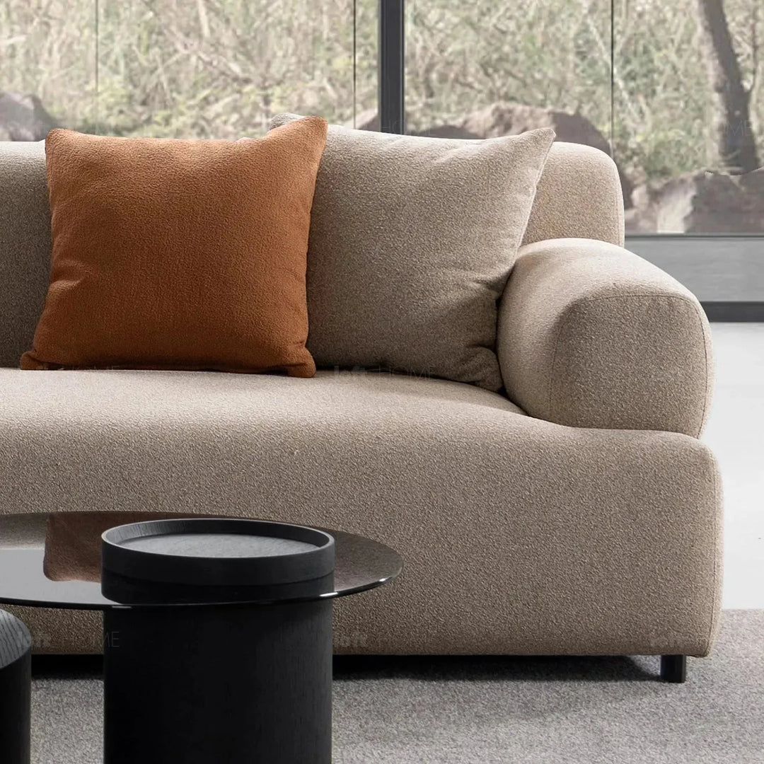 Minimalist sherpa fabric 4 seater sofa noble in close up details.
