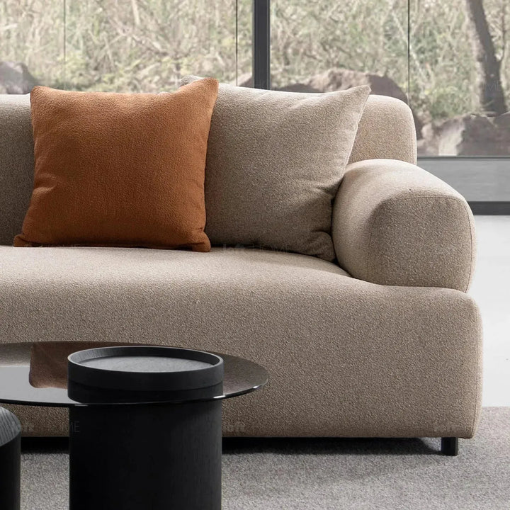 Minimalist sherpa fabric 4 seater sofa noble in close up details.