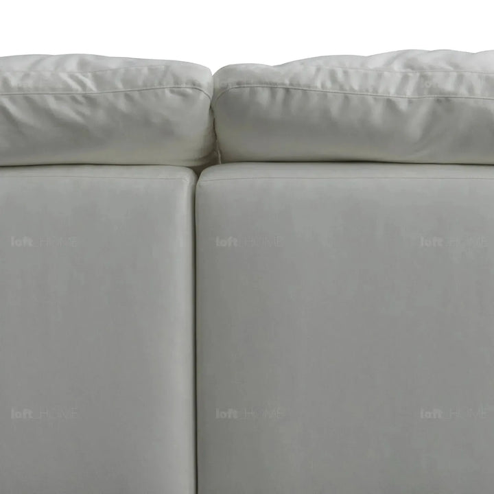 Minimalist suede fabric 5 seater sofa cloud in close up details.